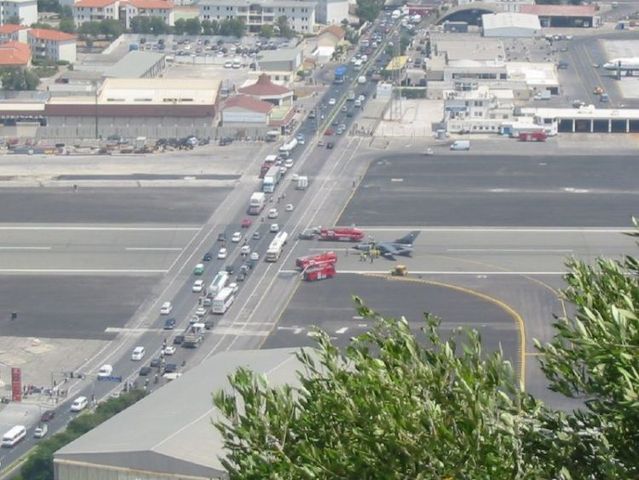 Gibraltar airport runway crosses the road to Spain (12 pics)