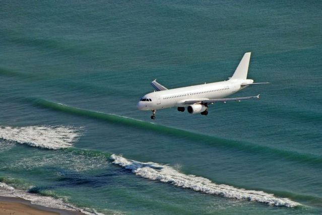 Gibraltar airport runway crosses the road to Spain (12 pics)