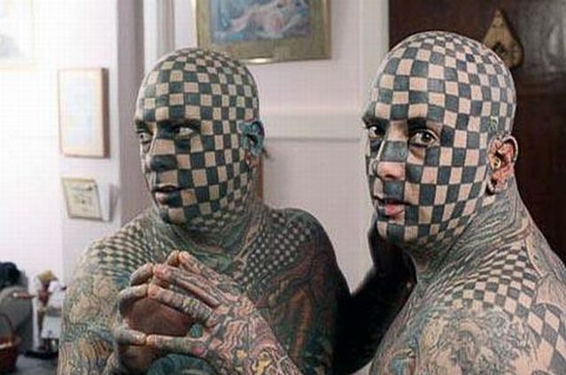 Series of the most WTF tattoos ;)  (60 photos)