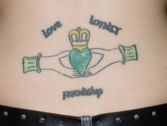 Series of the most WTF tattoos ;)  (60 photos)