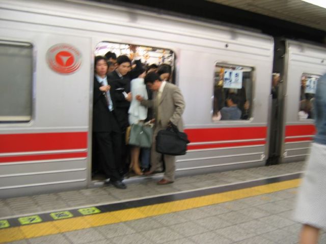 Izismile.com - The rush hour in Japan (14 pics + 2 videos)