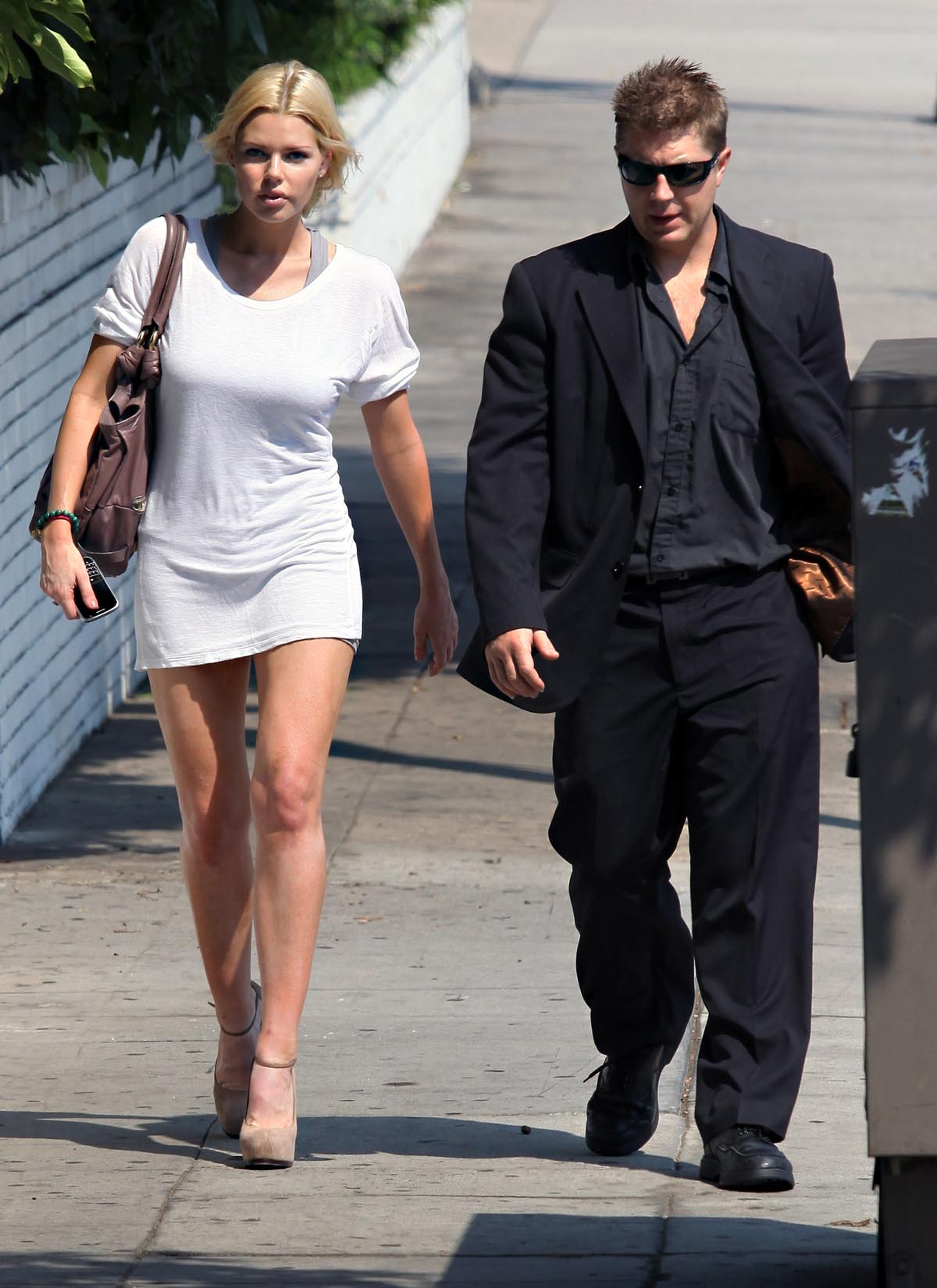Sophie Monk has a long shirt or a short dress (9 pics)