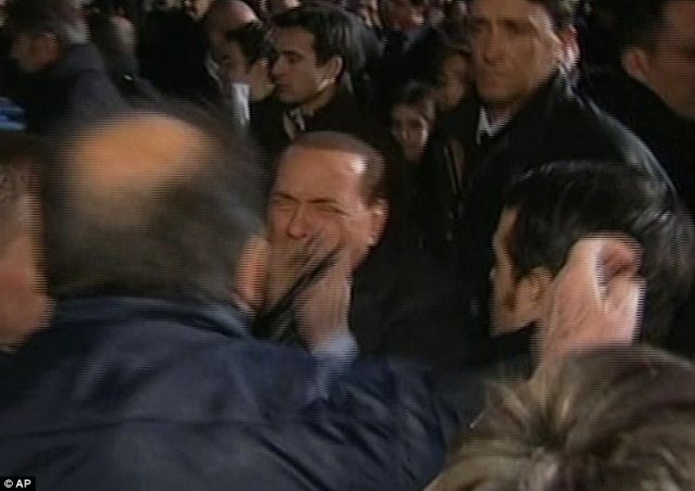 Berlusconi Gets a Broken Nose and Loses Two Teeth during the Assault (7 pics+1 video)