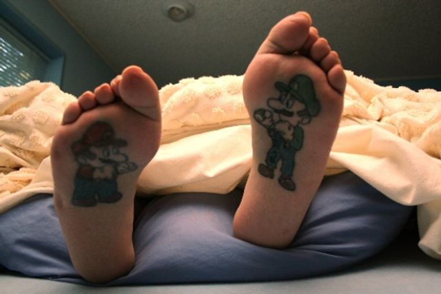  people will regret them. Tattoos of Famous Video Game Heroes (32 pics)