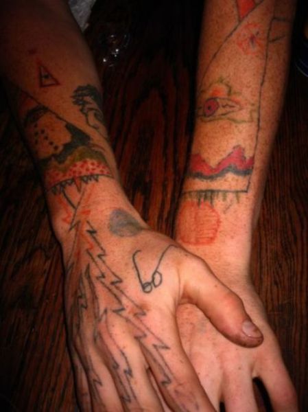 Horrible Self-made Tattoos