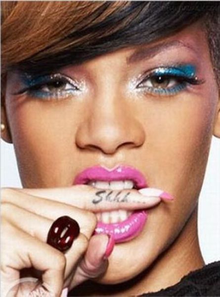 Return to Exploring Rihanna's Tattoos 20 pics 