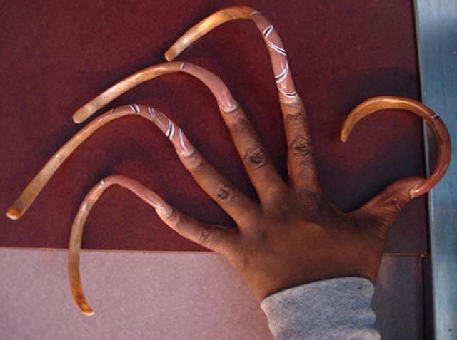 Unwieldy Long Fingernails on Women