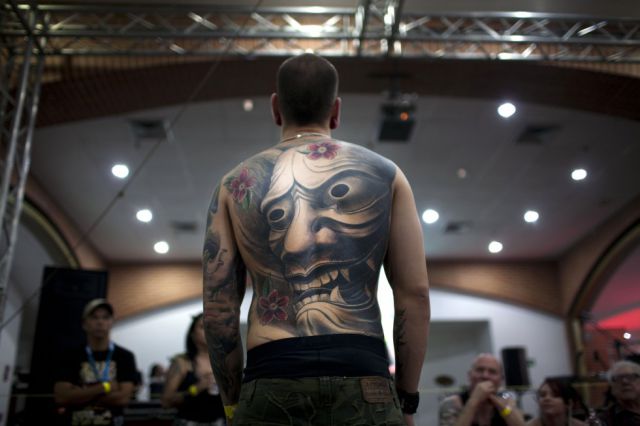 http://img.izismile.com/img/img5/20120203/640/venezuela_tattoo_show_640_02.jpg