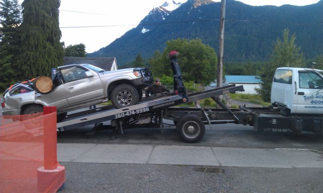 Couple�s Truck Crunched By Nature