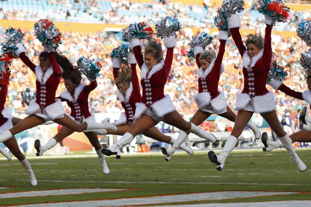 Cheerleading Snow Maidens Spread the Christmas Spirit