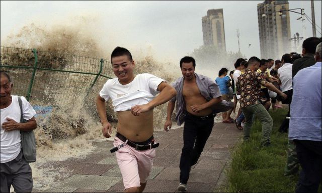 Spectators Get Washed Away by Typhoon Trami