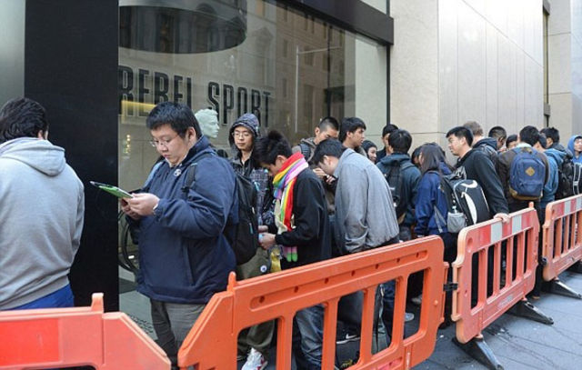 The iPhone 5 Frenzy as People Line Up to Get Theirs First