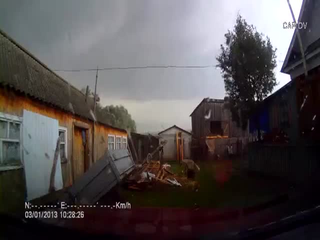 Car-Cam Records Tornado Wrecking Russian Village