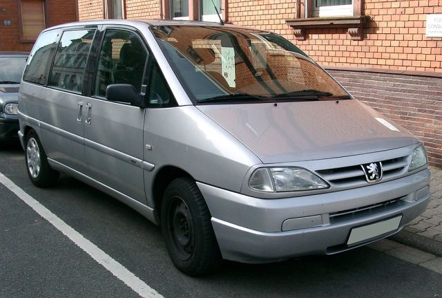 An Ordinary Peugeot Made Over into a Sleek and Sporty McLaren