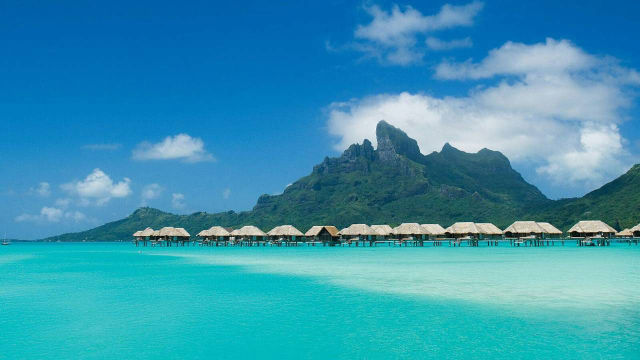 I Would Rather Be in Bora Bora Now Than at My Work Desk