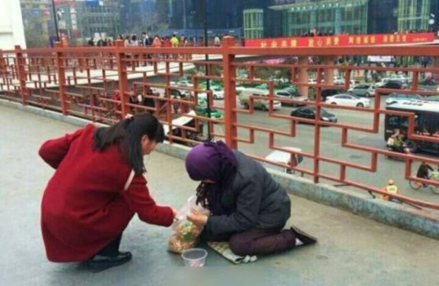 This Chinese Beggar Looks Like She Eats The Money She