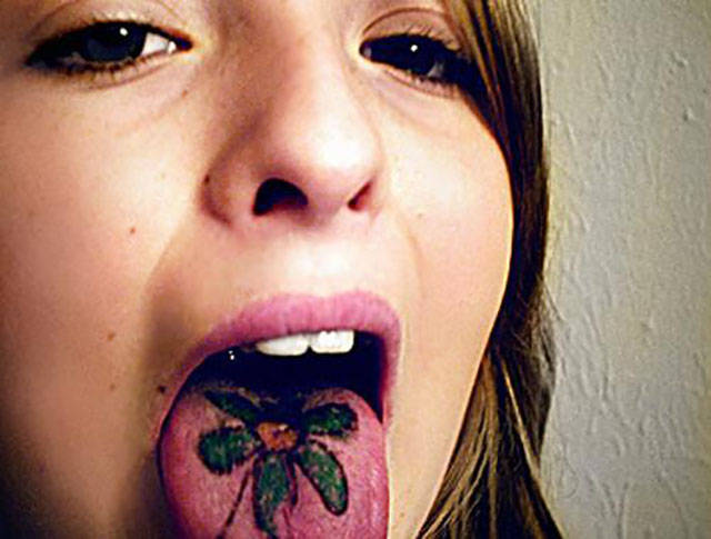 Fashion Takes A New Turn With Tongue Tattoos