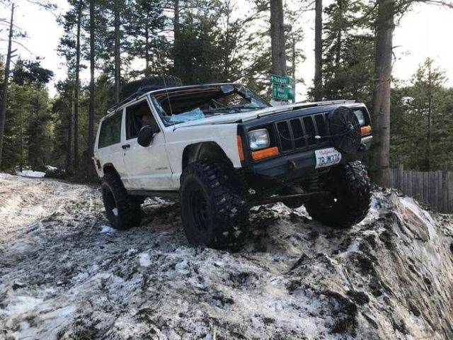 Jeep Digging From Under The Snow
