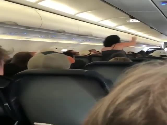 Lady Goes Crazy On A Plane Before Take Off