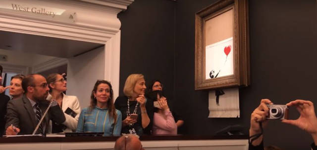 Banksy’s “Girl With Balloon” Is Sold For $1M, But That’s Where Banksy Does His Trick