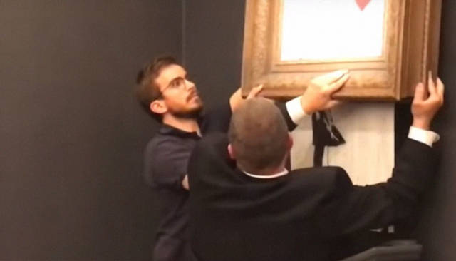 Was Banksy’s Stunt Actually Real? This Man Has His Doubts