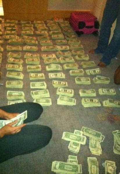 Do You Think These Strippers Bathing In Banknotes Are Really That Rich?