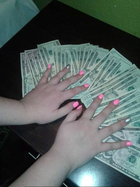 Do You Think These Strippers Bathing In Banknotes Are Really That Rich?