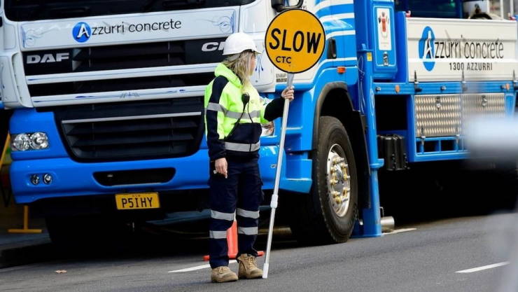 Girls Get Paid $130,000 A Year For Holding Street Signs