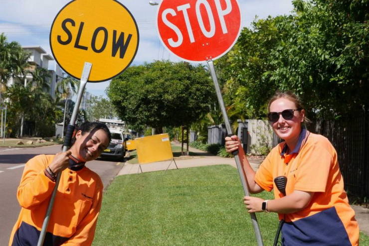 Girls Get Paid $130,000 A Year For Holding Street Signs