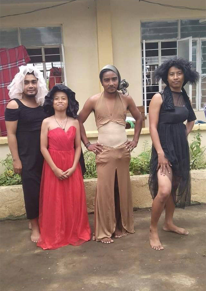 Filipinos Aren’t Shy To Pose In Mismatched Clothes They Got From Taal Volcano Donations