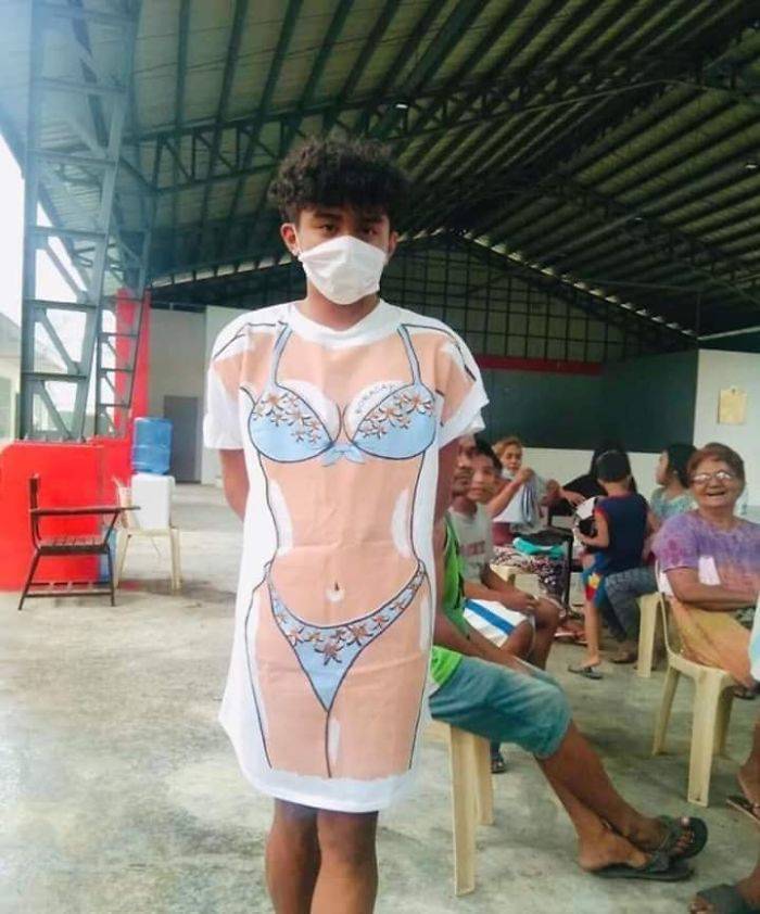 Filipinos Aren’t Shy To Pose In Mismatched Clothes They Got From Taal Volcano Donations