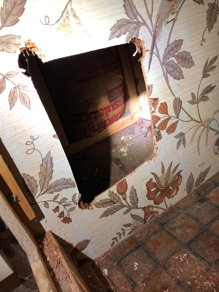 Family Finds A Curious Treasure Inside Their Own Wall