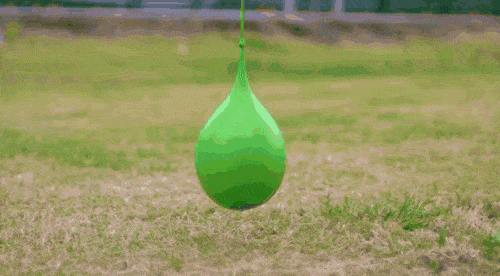 Hitting A Balloon With A Golf Club