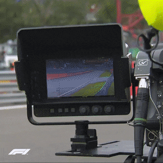 Would You Like To Watch The Operators Filming Formula 1 Cars Passing By?