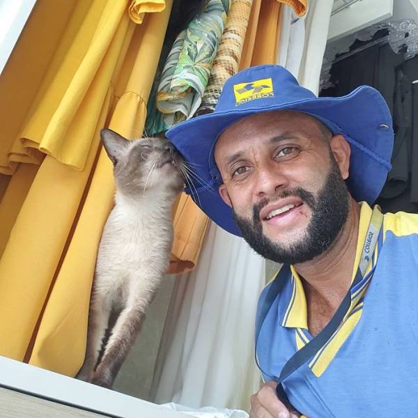 This Mailman Really Loves Animals!