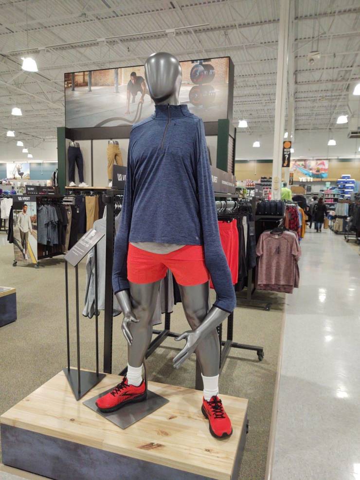 Funny mannequin in the store with hands below the knees.