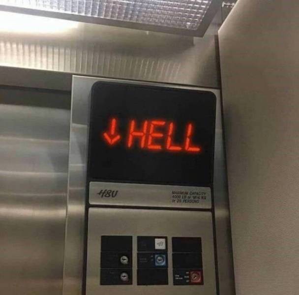 Screen in the elevator saying "hell" with an arrow down.