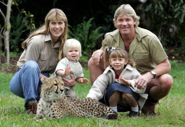 Steve Irwin family posing with a cheetah.
