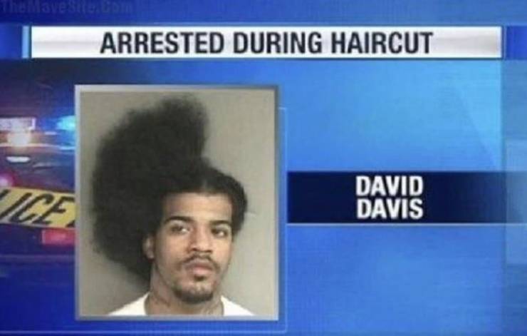 David Davis with only half of his hair cut because he was arrested during his haircut.
