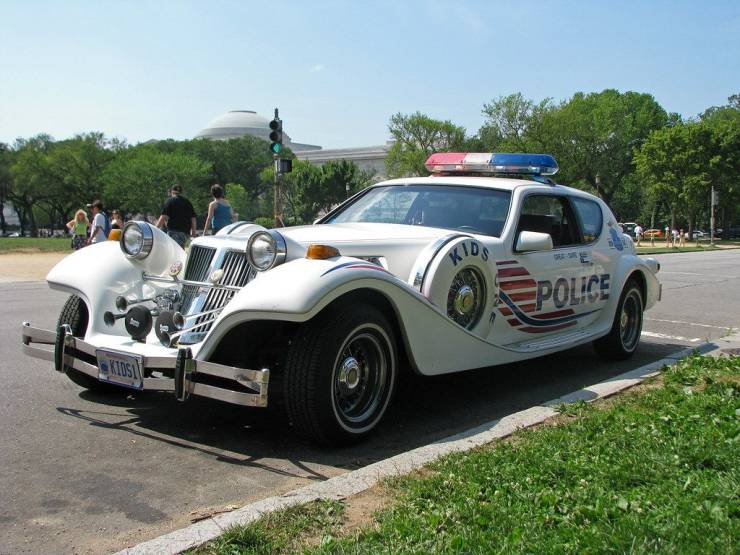 A police-look car in an amusement park.