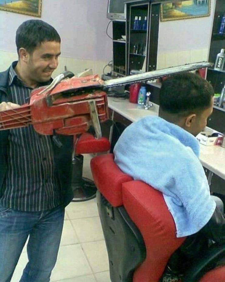 A hairdresser cutting his client hair with a chain saw.