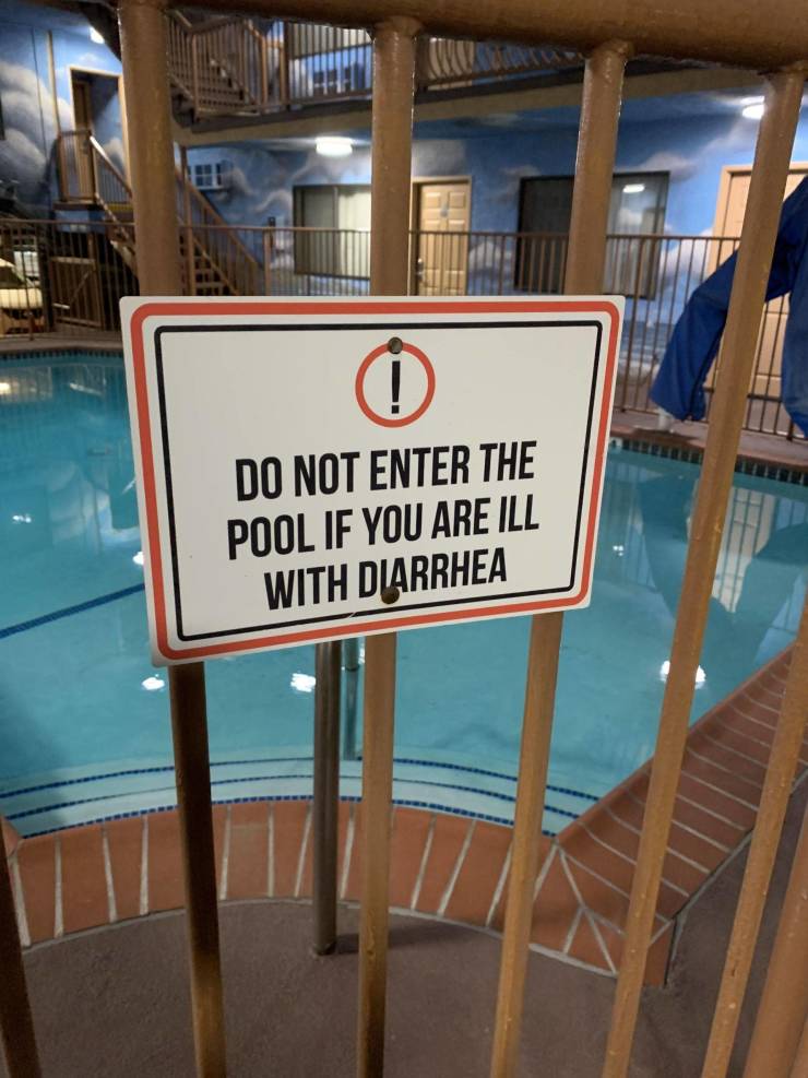 A warning sign prohibiting entering a swimming pool if a person has diarrhea.