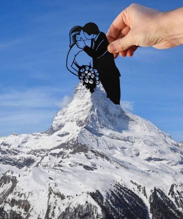 Artist Cleverly Adds Paper Cutouts To Popular Landmarks