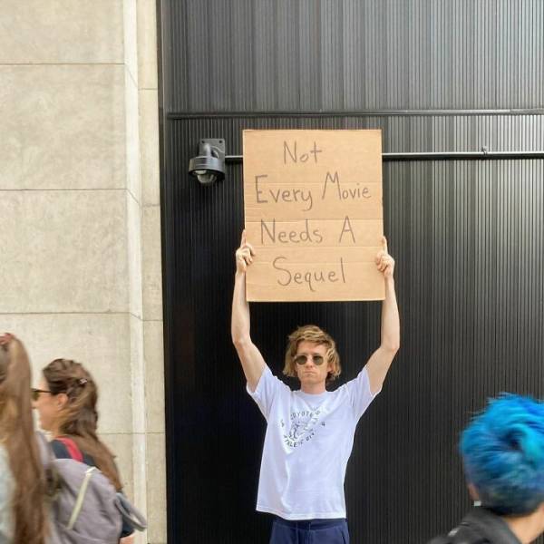 “Dude With Sign” Will Never Stop Protesting!