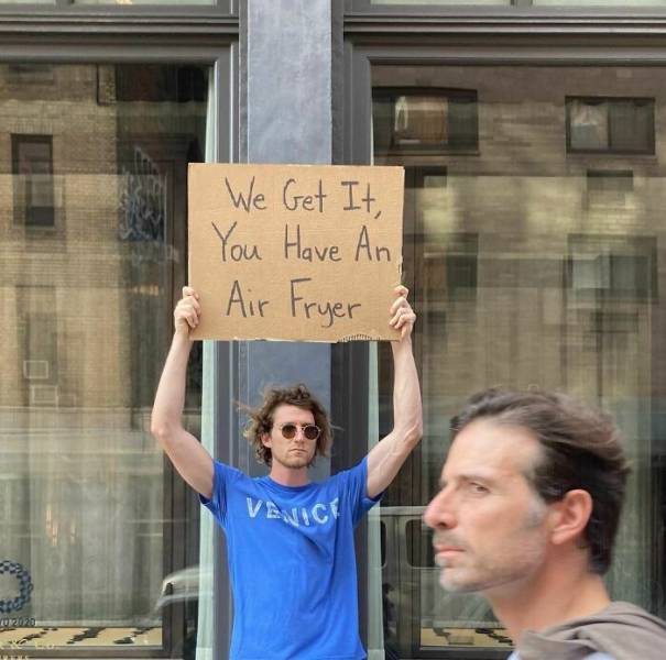 “Dude With Sign” Will Never Stop Protesting!