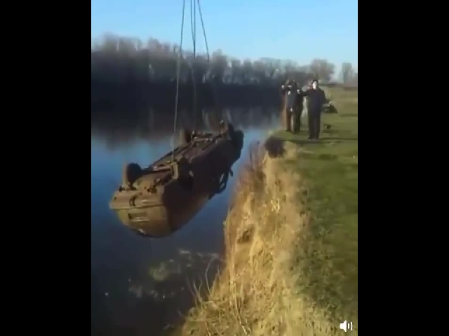 Fishing A Sunken Car From The River