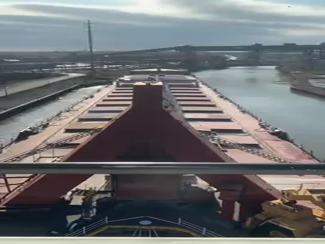 Large Boat Navigates The Cuyahoga River