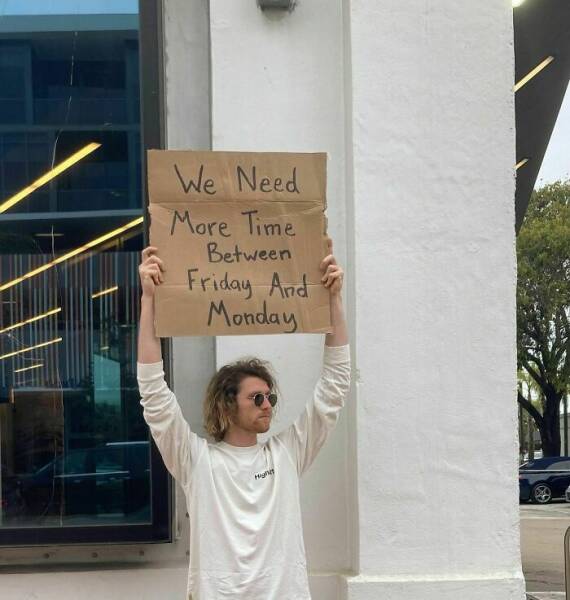 Dude With Sign” Never Stops Protesting Stuff…