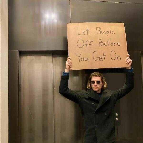 Dude With Sign” Never Stops Protesting Stuff…