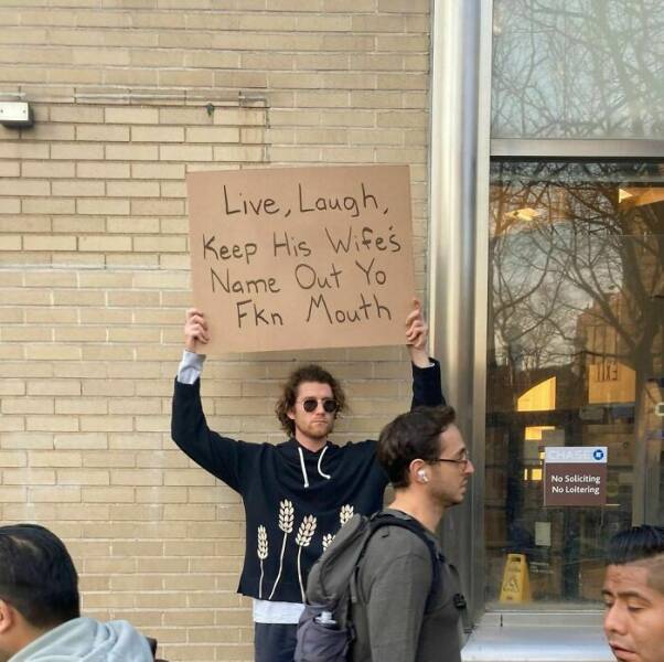 Dude With Sign” Never Stops Protesting Stuff…